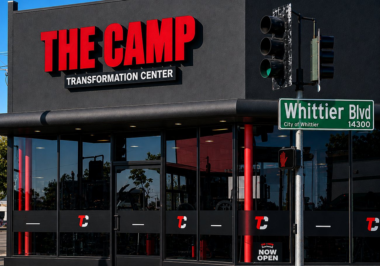 The Camp Transformation Center on Whittier Blvd, with a Now Open sign in the window.
